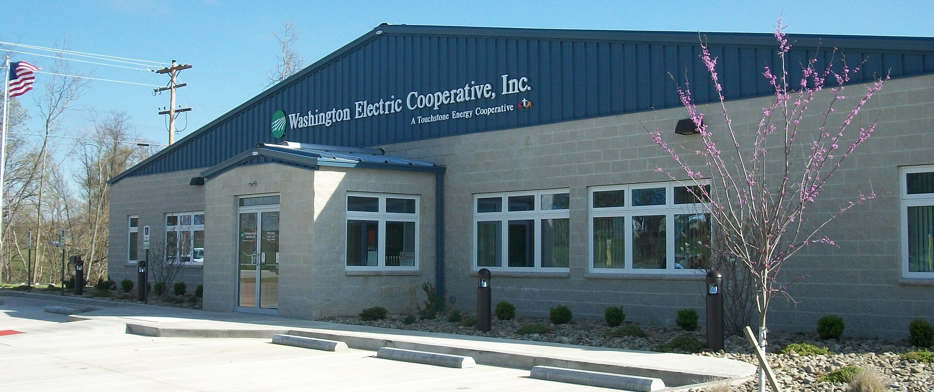 Picture of Washington Electric Cooperative's office building on a sunny spring day